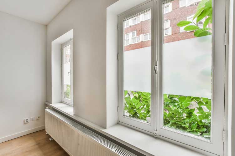 home office with natural light from large windows